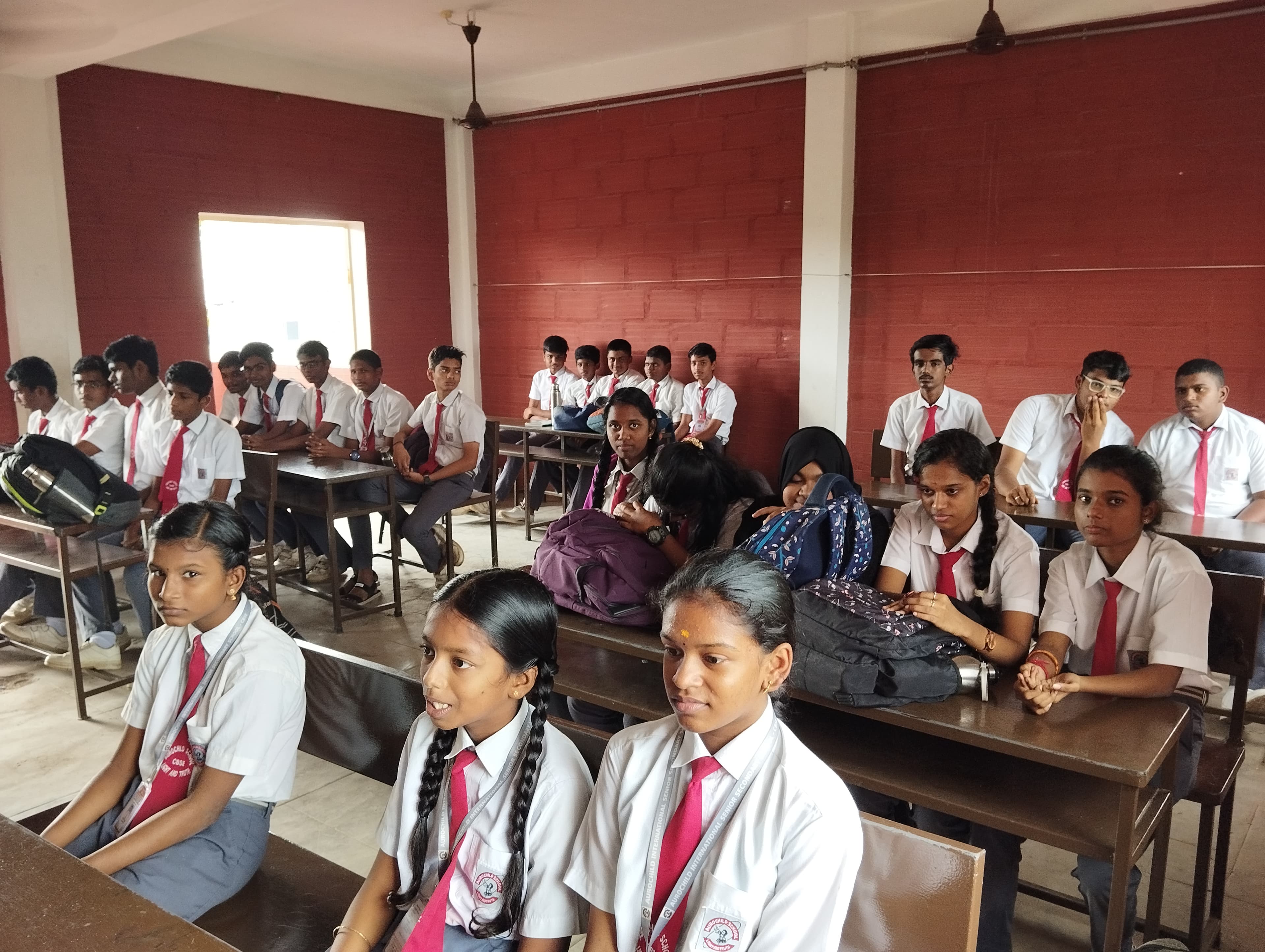 Students learning inside an Aurochild classroom